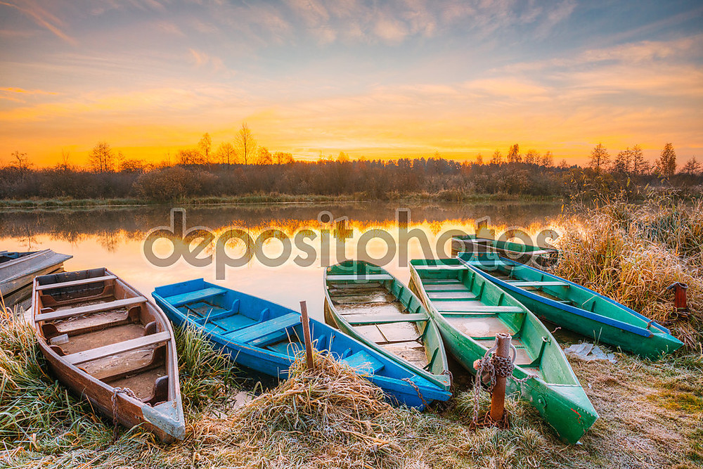 Фотообои «River and old rowing fishing boats at beautiful sunrise sunset» - фото (1)